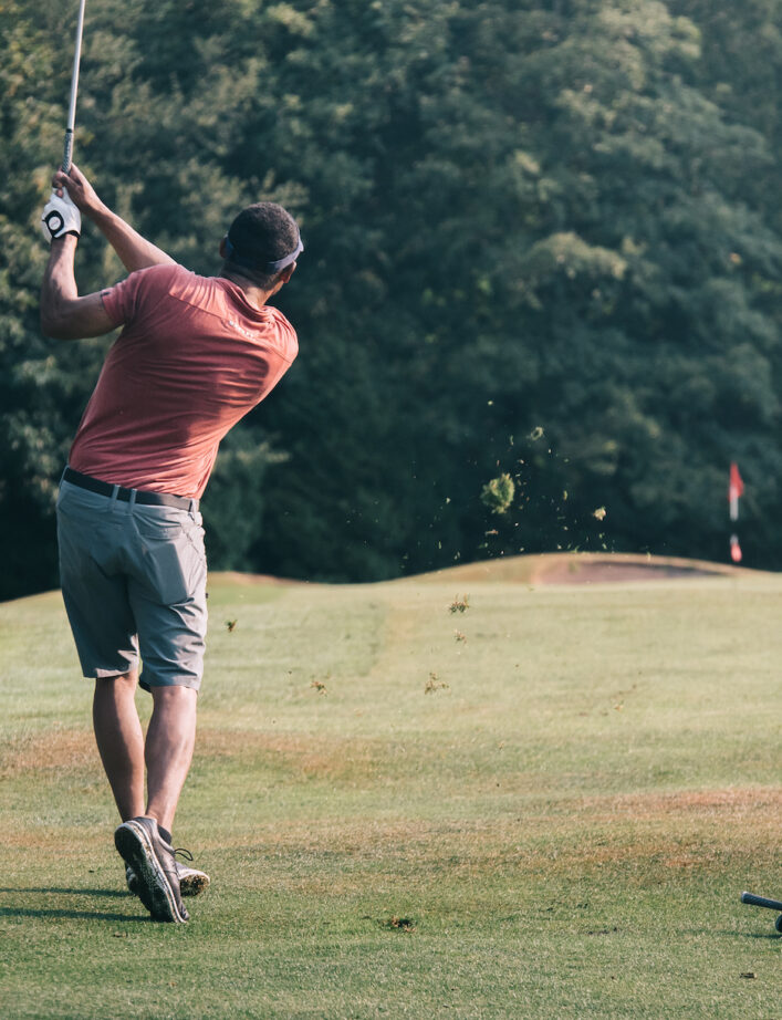 Black Male Golfer Hitting Approach